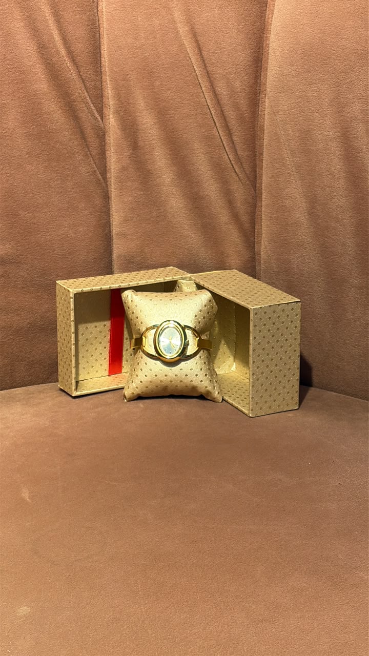Gold-Tone Oval Dial Watch